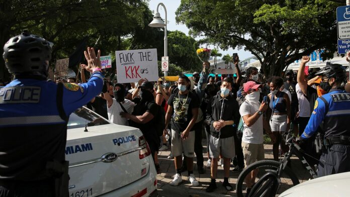 Florida doctors aren’t asking coronavirus patients if they took part in protests, health official says