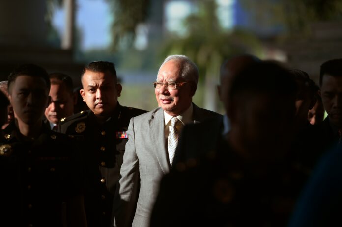 Former Malaysian Prime Minister Najib Razak found guilty on all seven charges related to 1MDB scandal