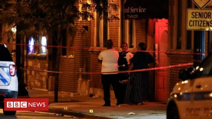 Fourteen mourners shot at Chicago funeral home