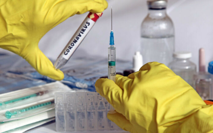 French expert warns full coronavirus vaccine unlikely by next year