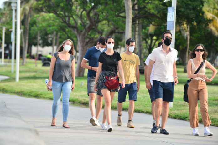 Health Expert: Mask Wearing, Some Social Distancing Will Continue For ‘Several Years’