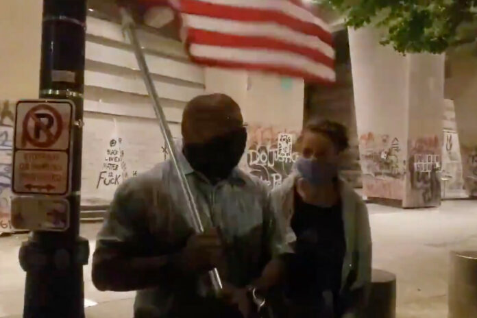 Man with flag confronts Portland protesters: ‘None of you guys represent black lives’