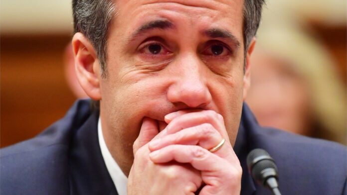 Michael Cohen sues AG Barr, claims he was sent back to prison to prevent Trump tell-all
