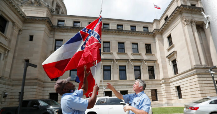 Mississippi Governor Signs Law to Remove Flag With Confederate Emblem