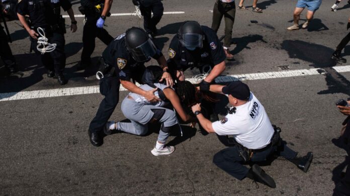 NY police injured in clash with protesters on Brooklyn Bridge