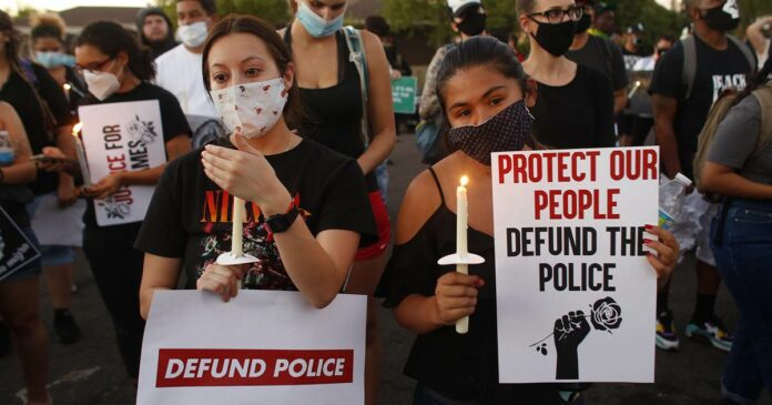 Phoenix protesters demand answers after police fatally shoot man parked in driveway