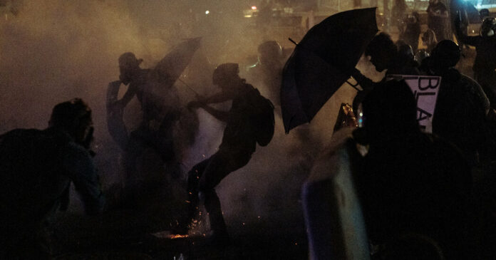 Portland Protest Tactics: Umbrellas, Pool Noodles and Fire