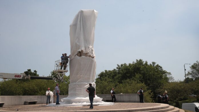 Protesters clash with police in violent encounter at Chicago’s Columbus statue; 12 arrested, many injured