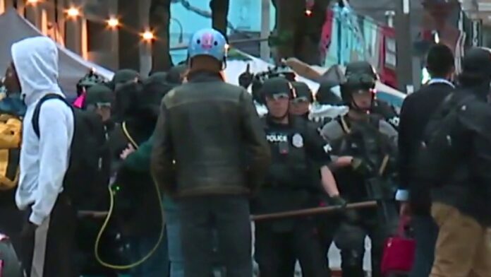 Seattle police clearing out ‘CHOP’ zone after mayor declares unlawful assembly