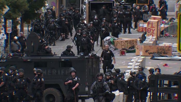 Seattle Police disperse protesters in occupied CHOP area after emergency order