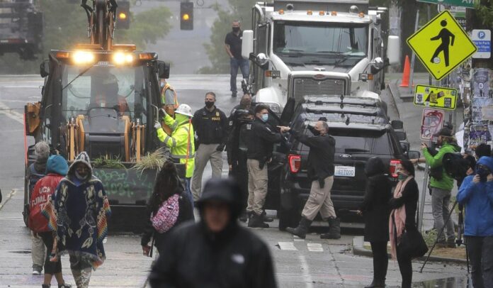 Seattle police reclaim autonomous zone after wave of violence, two deaths