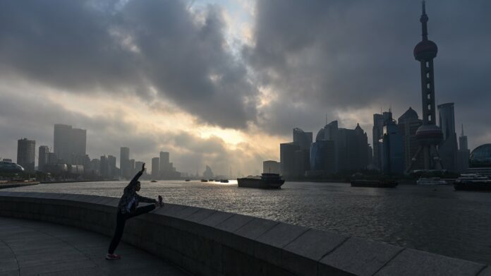 Shanghai Composite slumps 4% after data and as vaccine hopes fade