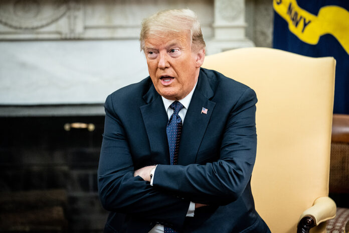 Shout or stay silent? Trump team splits over coronavirus surge