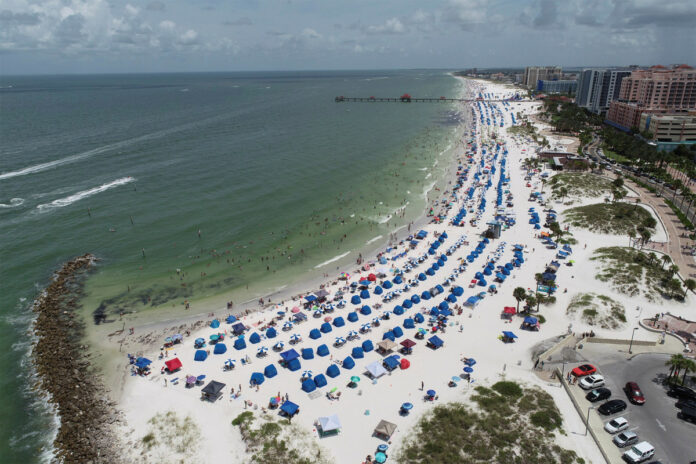 Six US states see record surges in COVID-19 cases, Florida becomes epicenter