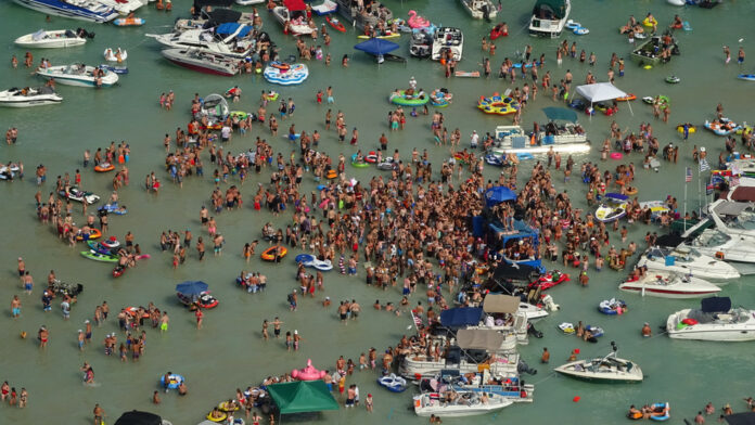 Torch Lake Sandbar listed as possible COVID-19 exposure site following 4th of July party