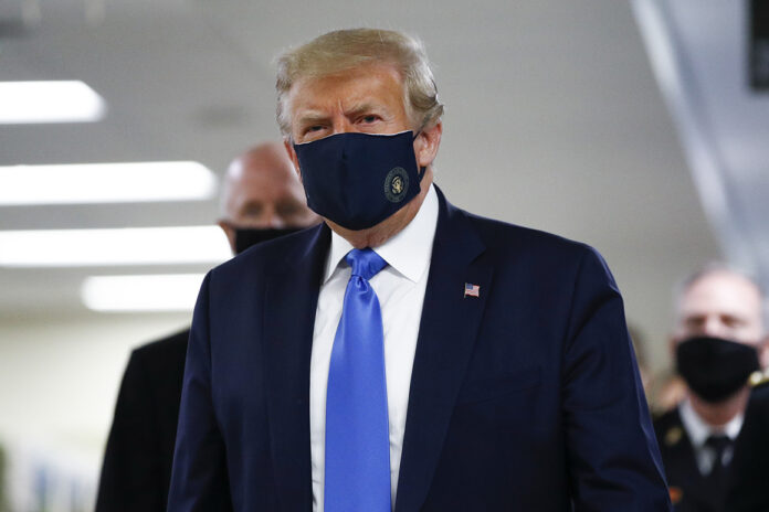 Trump wears mask in public for first time during visit to Walter Reed