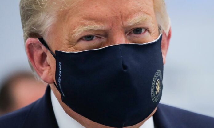 Trump wears mask, voices hope on coronavirus vaccine in North Carolina