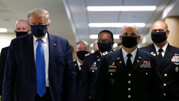 Trump wears mask while visiting wounded soldiers, medical workers at Walter Reed hospital