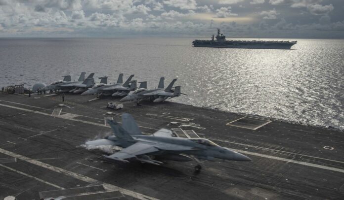U.S. admirals: China Sea carrier operation meant as message to Beijing