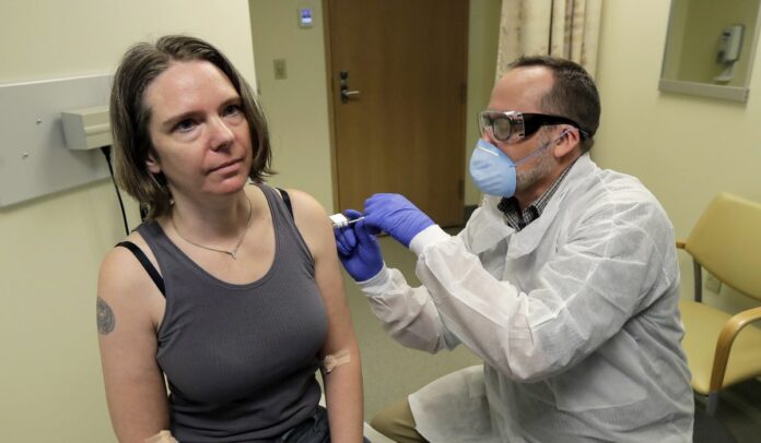 Virus vaccine put to final test in thousands of volunteers