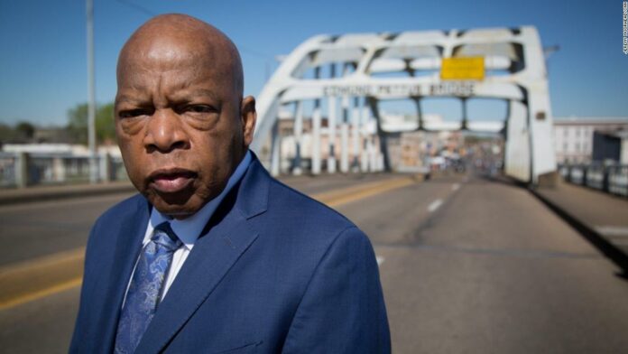 While America mourns John Lewis, Trump continues to divide the nation