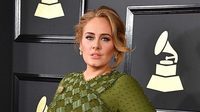 Adele slammed for wearing Bantu knots, Jamaican flag bikini: ‘Stop it for good’