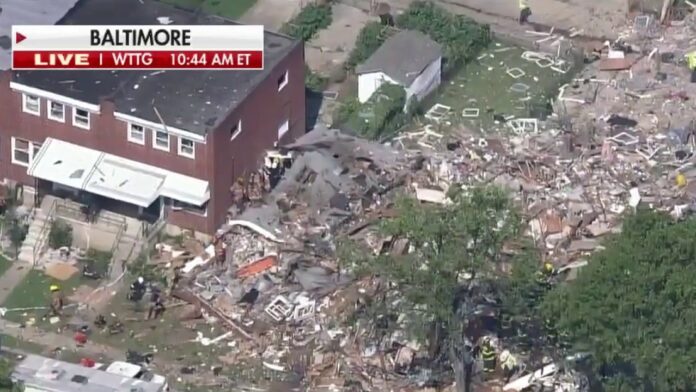 Baltimore gas explosion levels homes; at least 1 woman killed, rescues underway