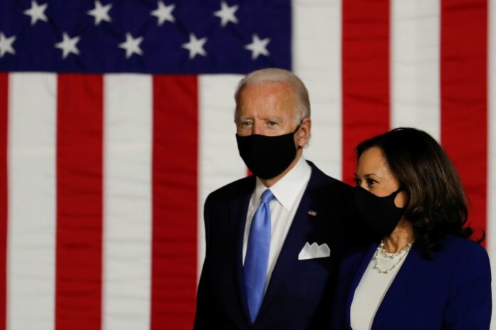 Biden formally introduces Harris as the Democratic ticket goes after Trump