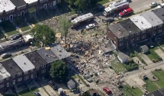 Explosion levels Baltimore homes; 1 dead, 1 trapped