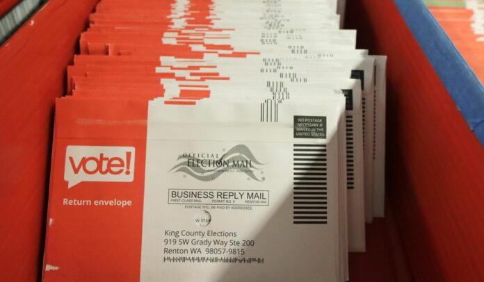Postage requirement for mail-in ballots not a poll tax, federal judge rules