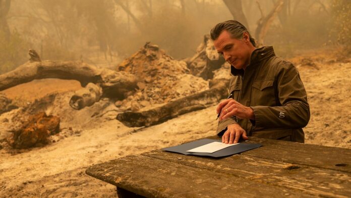 California governor signs bill giving prisoners battling wildfires a shot at becoming pro firefighters