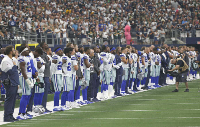 Cowboys players ponder kneeling during national anthem