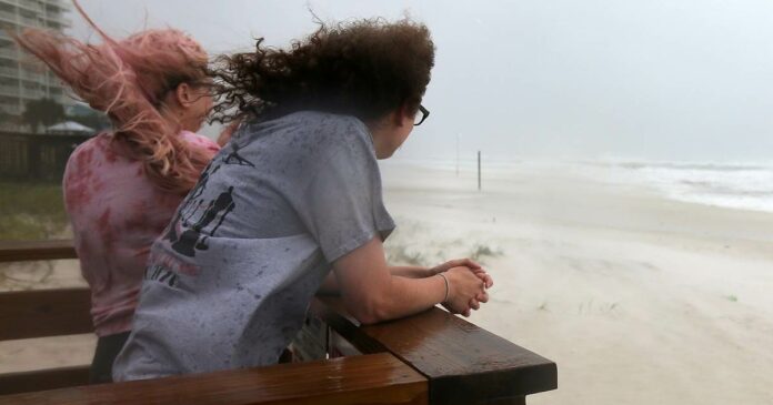 Hurricane Sally makes landfall as a Category 2 storm near Gulf Shores, Alabama, threatening record floods