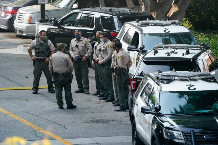 Los Angeles authorities in standoff with carjacking suspect amid reports of link to deputy ambush