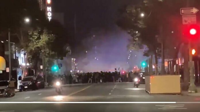 Oakland police assaulted during rioting; unrest prompts BART station closure
