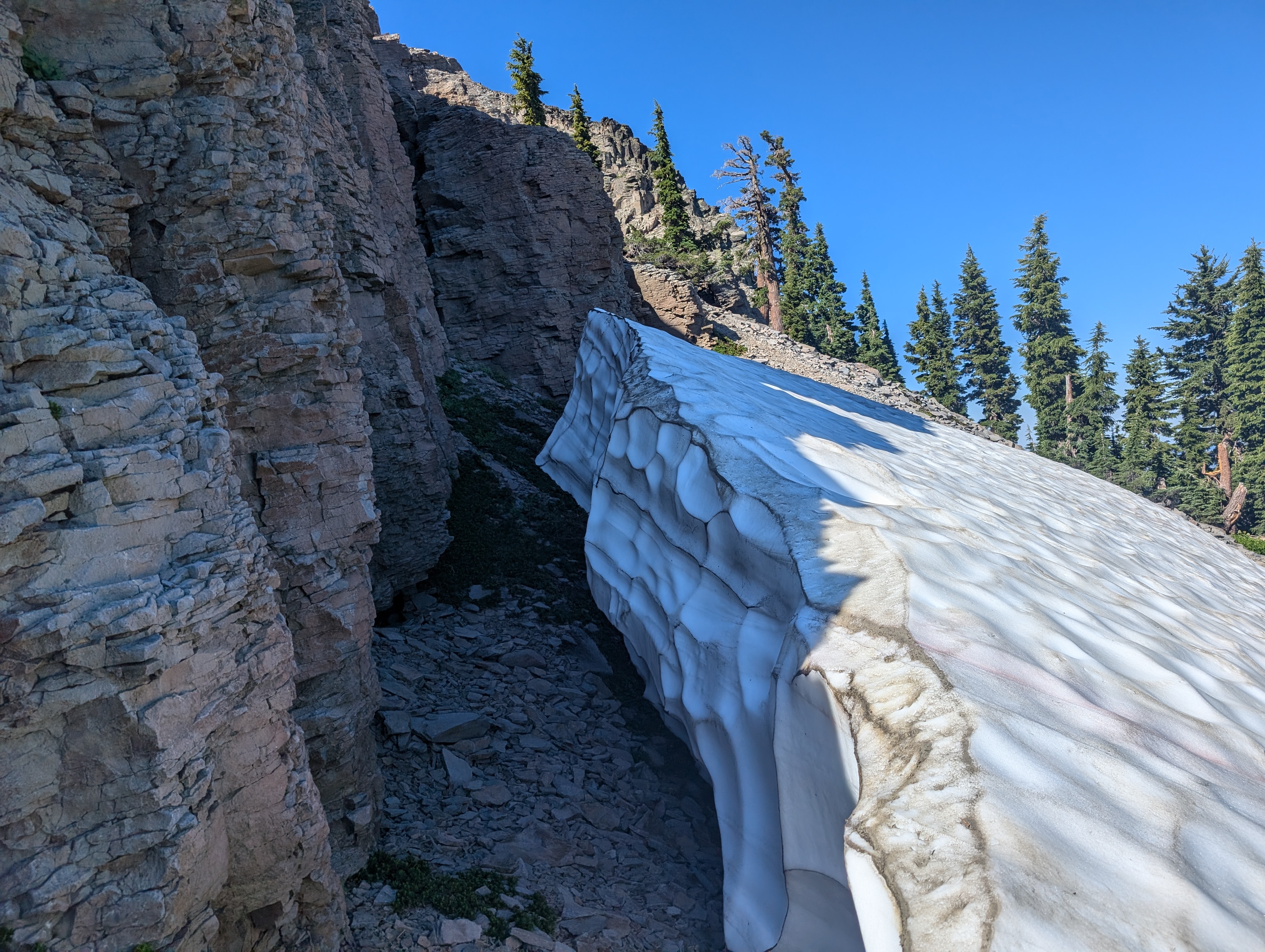 Large snow drift below the summit of Anderson Peak