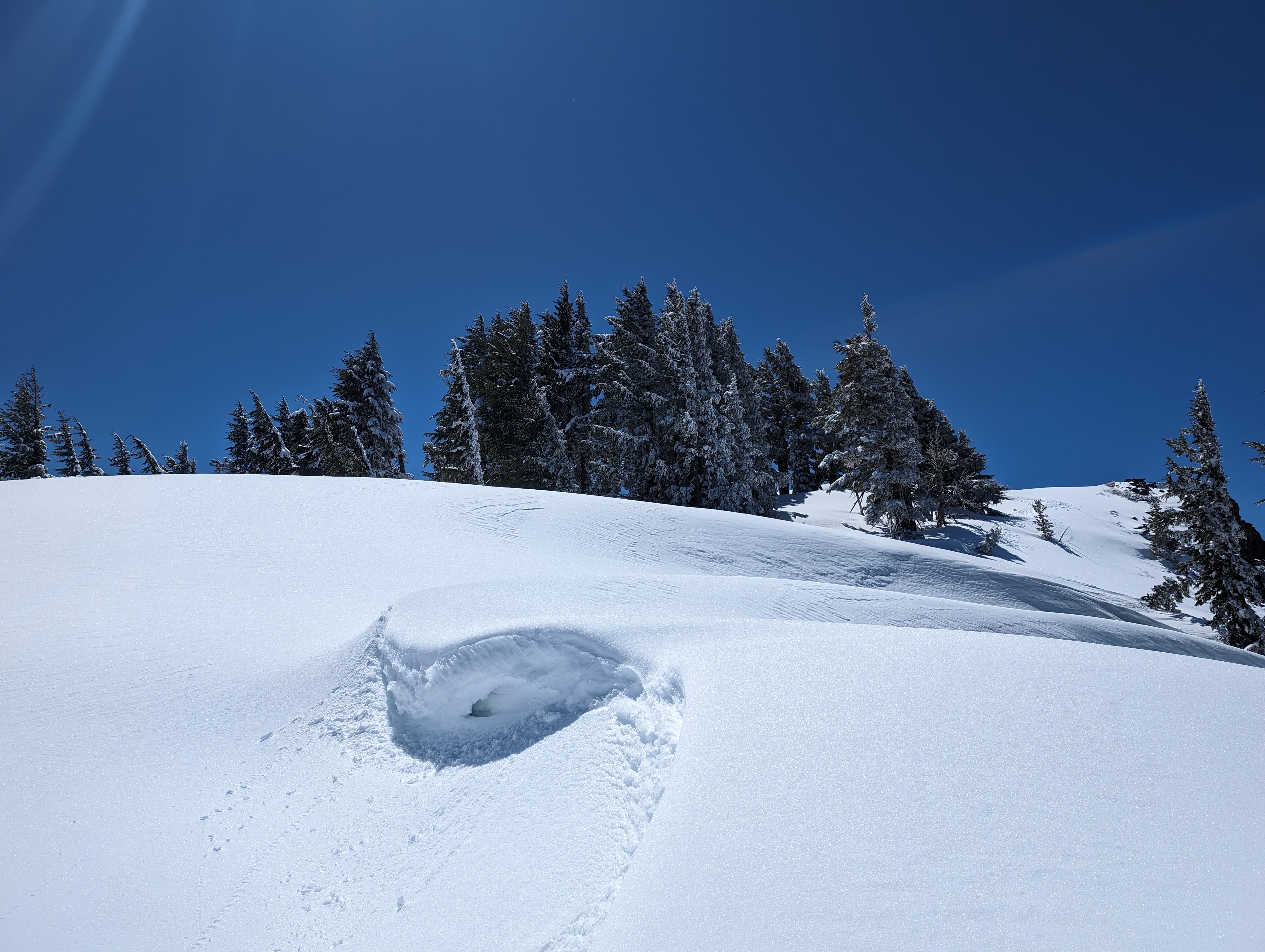 Nearing the top of the corniced ridge