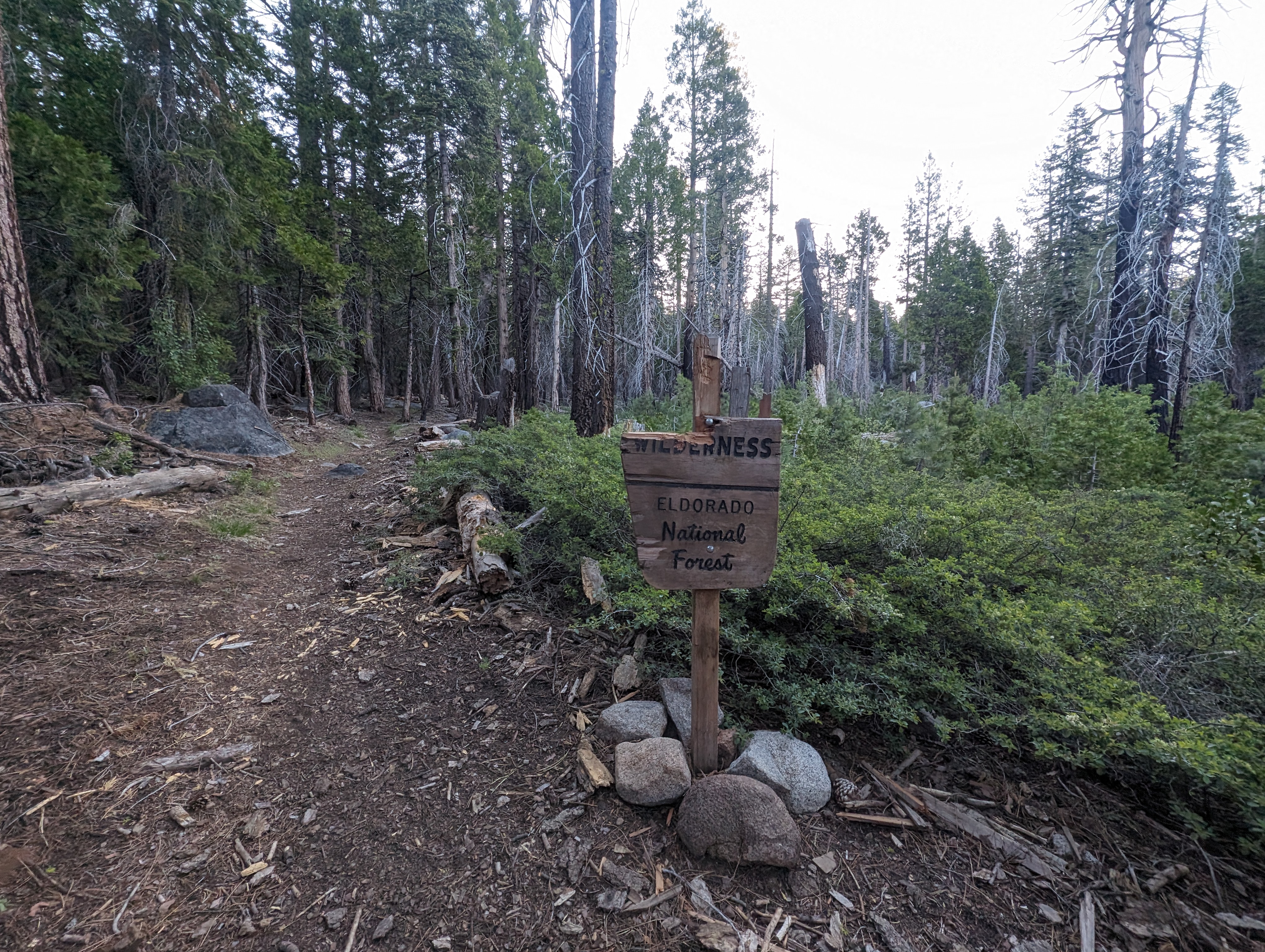 The broken wilderness sign. Thankfully I knew where I was