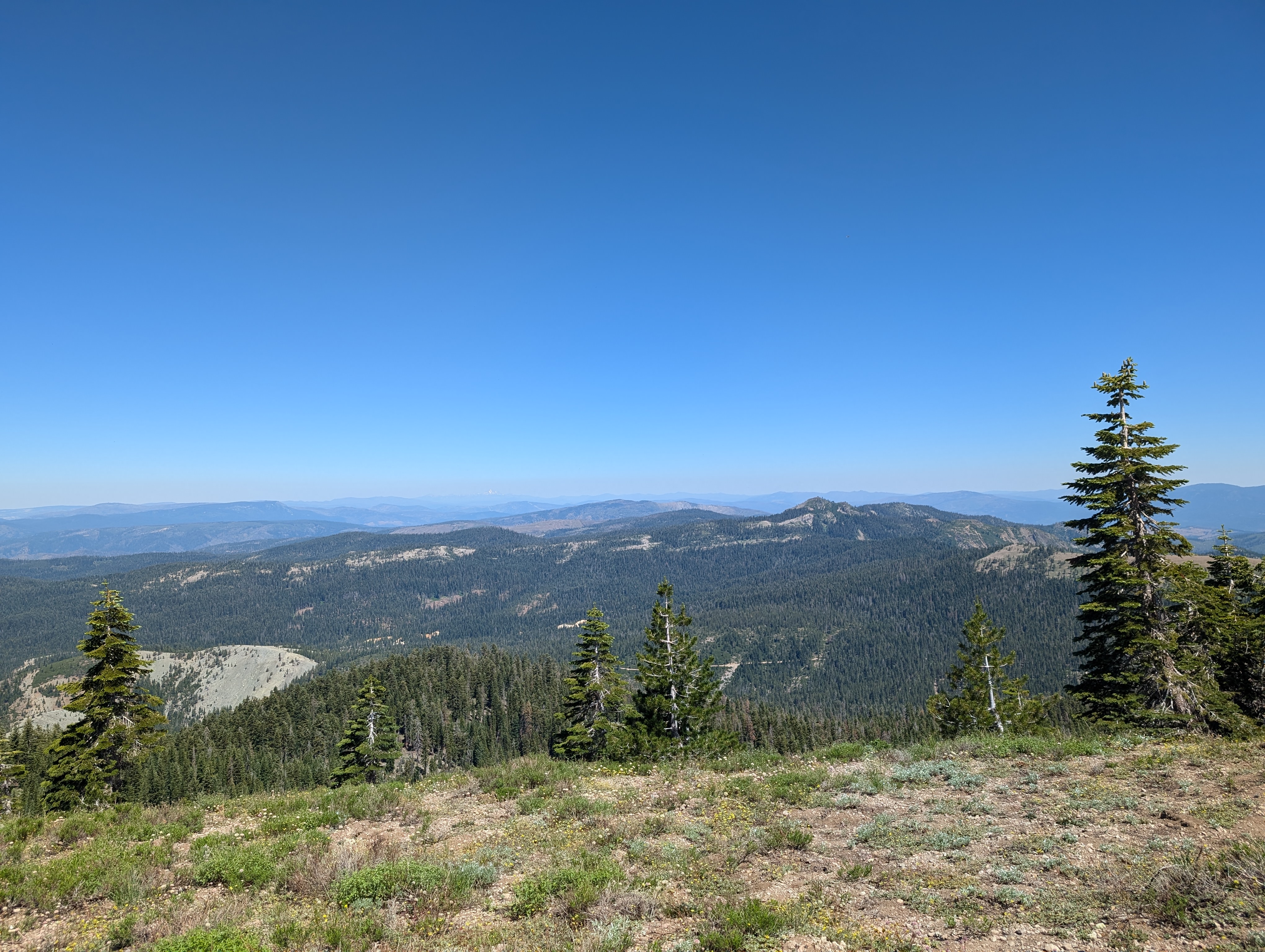 View looking north from the summit. Mt Lassen can faintly be seen left of center