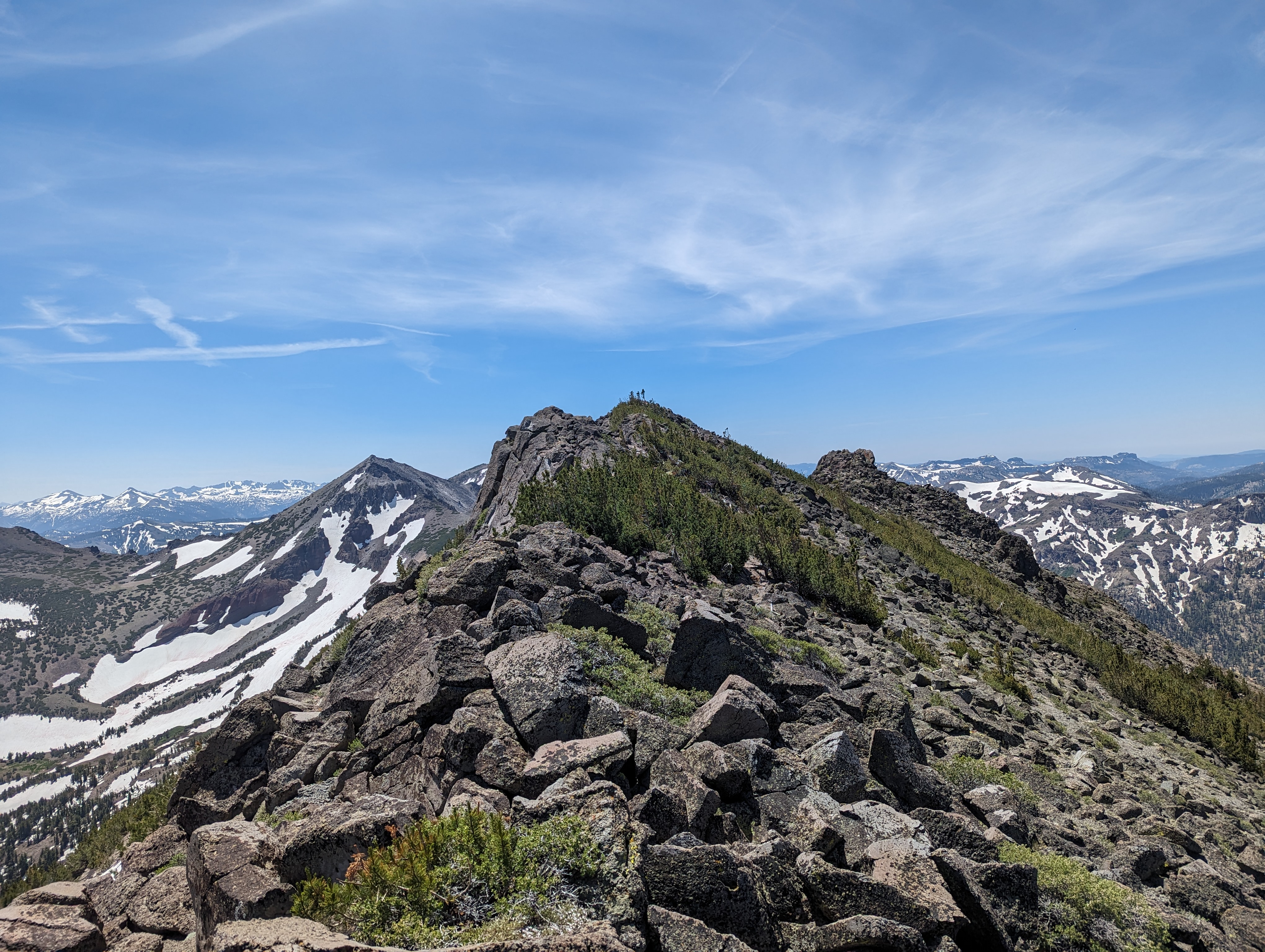 At the saddle just north of the southwest summit